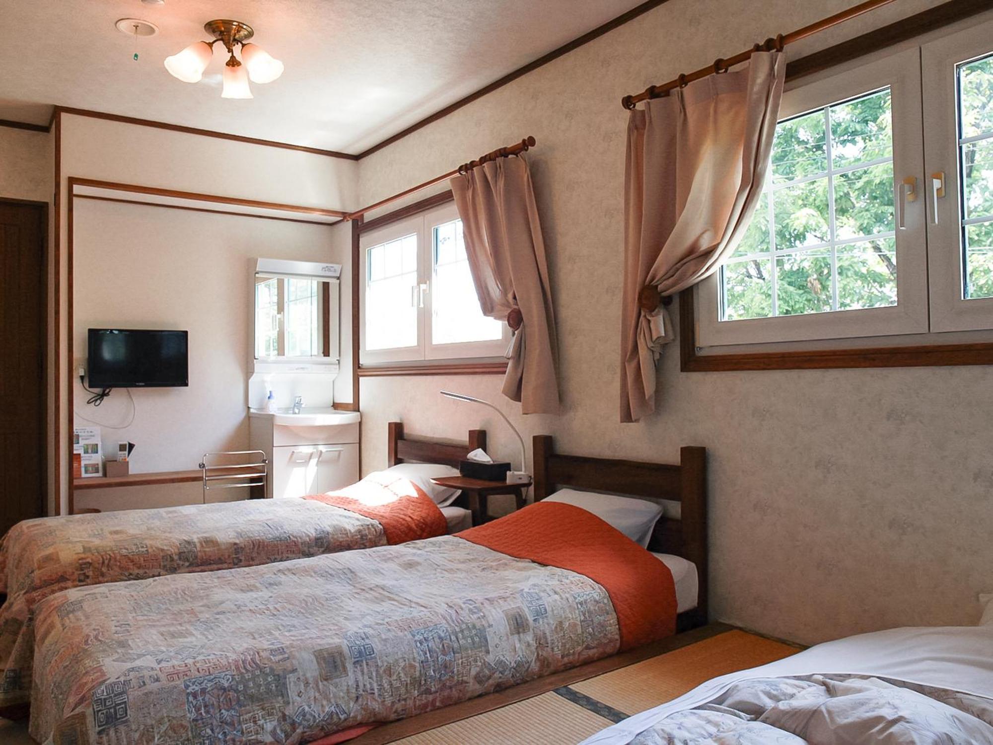 Hotel Land Haus Dancru Netz Cabaña Hakuba Exterior foto